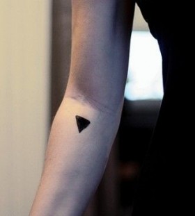 Black small geometric arm tattoo
