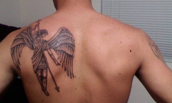Black soldier angel tattoo on shoulder