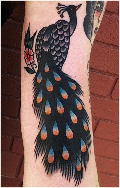 Blue feather peacock tattoo
