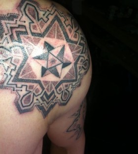 Brown and black stars geometric shoulder, back tattoo