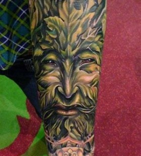 Celtic God green tattoo