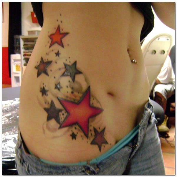 Colorful stars girl tattoo on hip