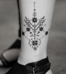 Cute flowers geometric tattoo on leg