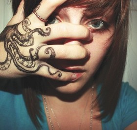 Cute girl octopus tattoo on arm