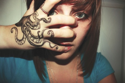 Cute girl octopus tattoo on arm