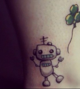 Cute green lovely robbot tattoo