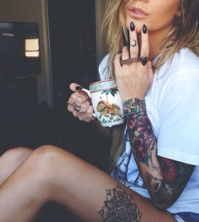 Cute lovely girl tattoo on leg