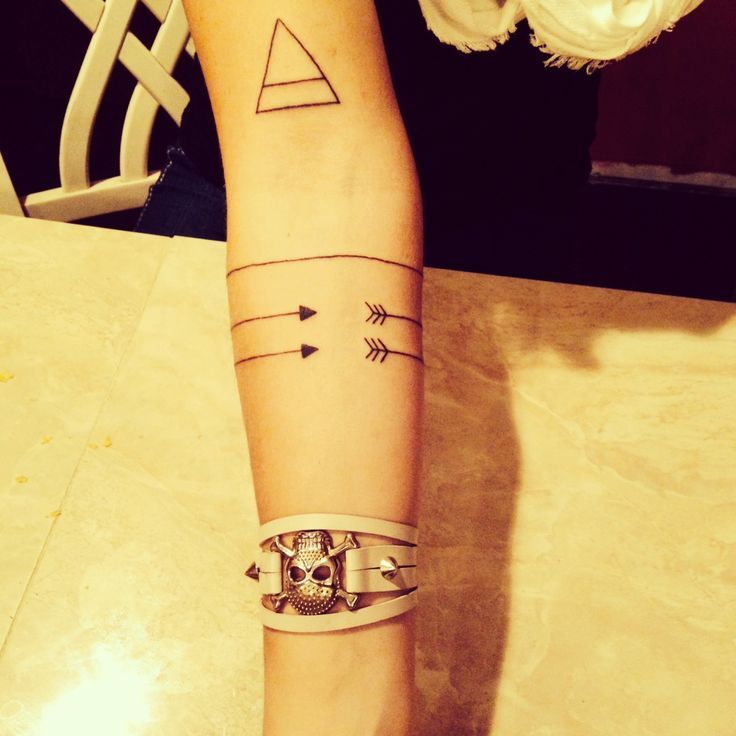 Cute tribal geometric arm tattoo