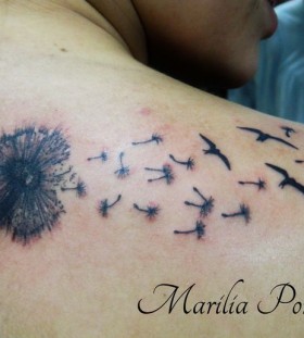 Dandelion bird tattoo by Marilia Pontes