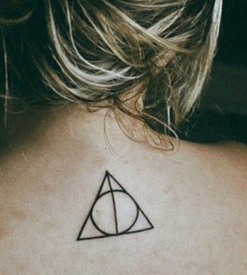 Girl's back Harry Potter tattoo