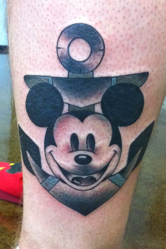 Gorgeous black Mickey Mouse tattoo on leg