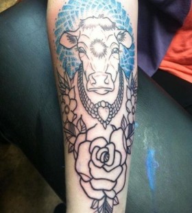Gorgeous black cow tattoo