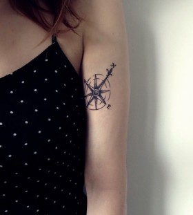 Gorgeous girl's compass tattoo on arm