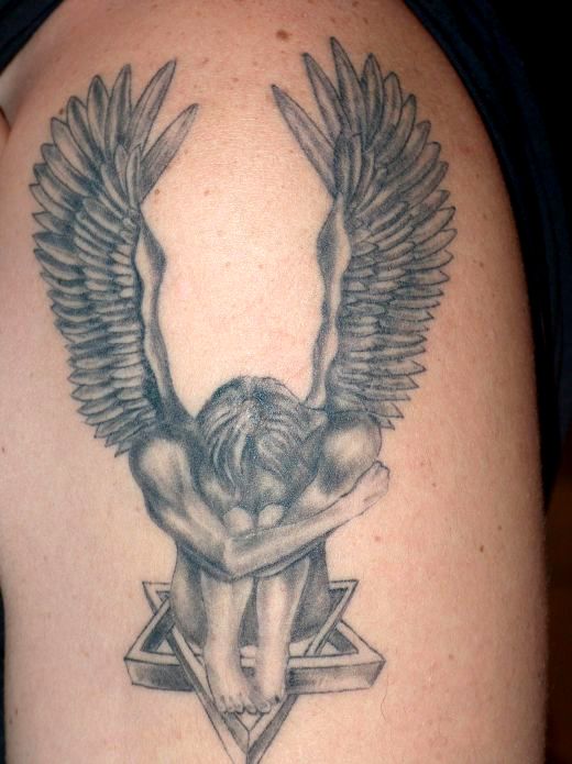 Gorgeous looking angel tatoo on arm