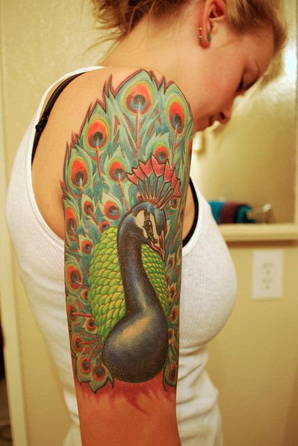 Gorgeous looking peacock tattoo