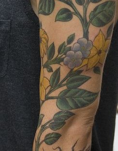 Gorgeous looking yellow tattoo