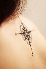 Gorgeous lovely compass tattoo on back