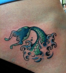 Green fish and mermaid tattoo