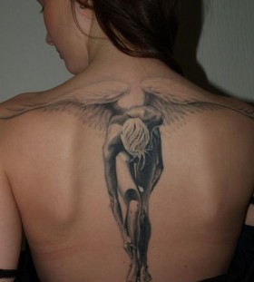Huge men's angel tattoo on shoulder