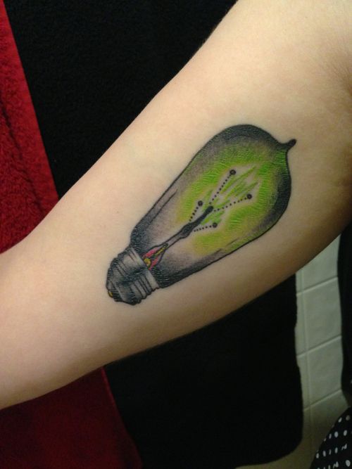 Incredible black and green tattoo