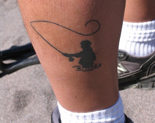 Leg black fishing tattoo