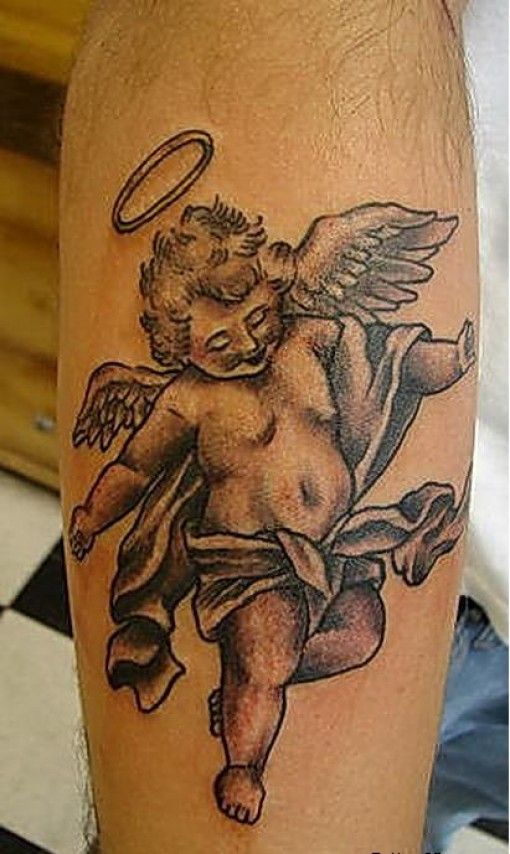 Little boy angel tatoo on arm