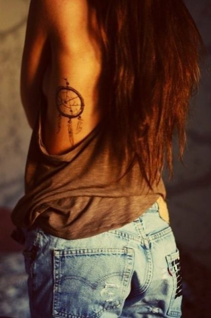 Long hair and lovely dreamcatcher tattoo