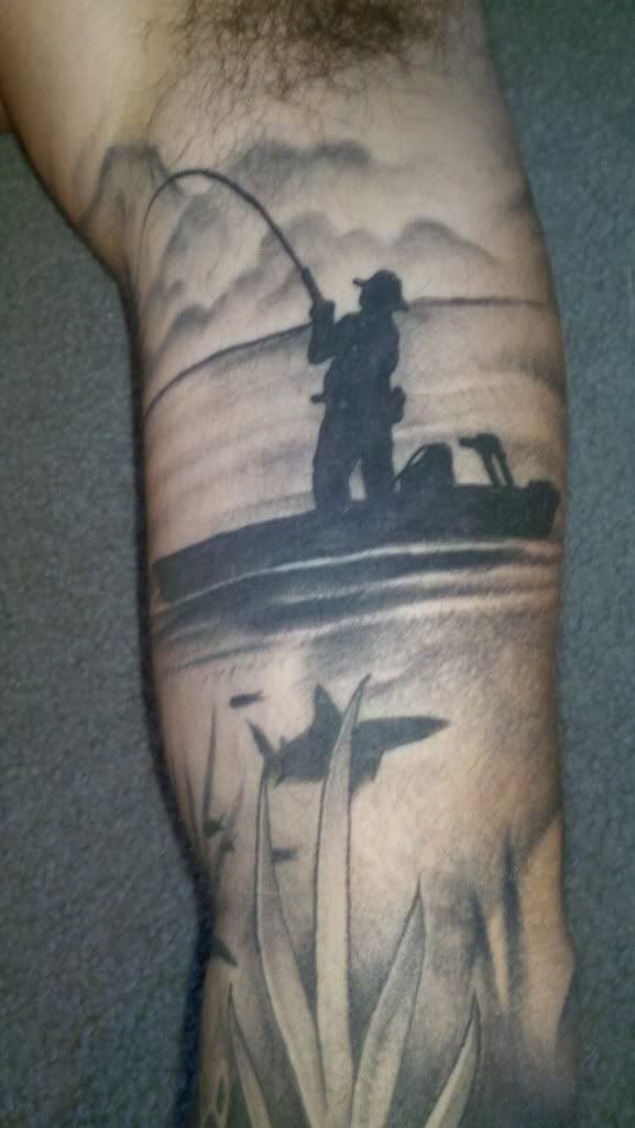 Men s black fishing tattoo TattooMagz Tattoo Designs Ink Works 
