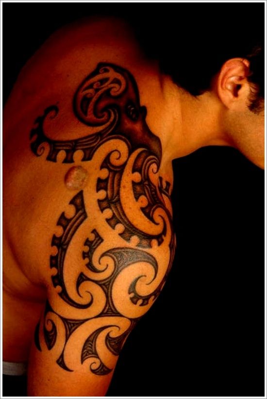 Men’s shoulder’s octopus tattoo on arm