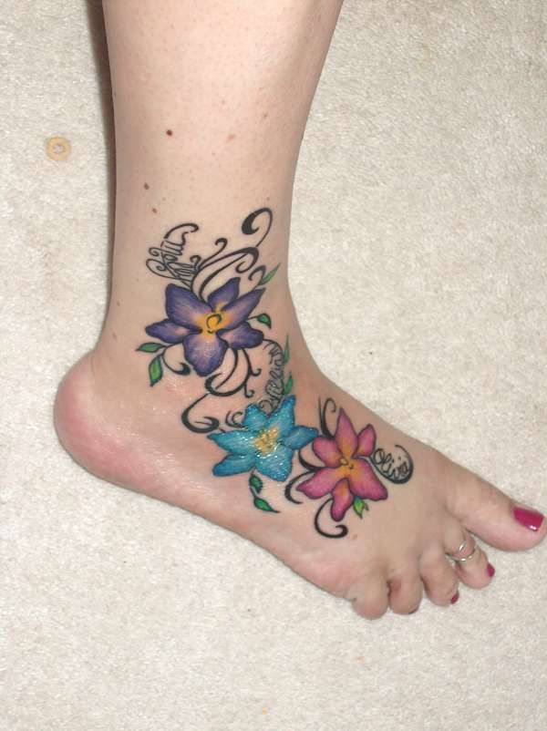 Purple flower girl tattoo on foot