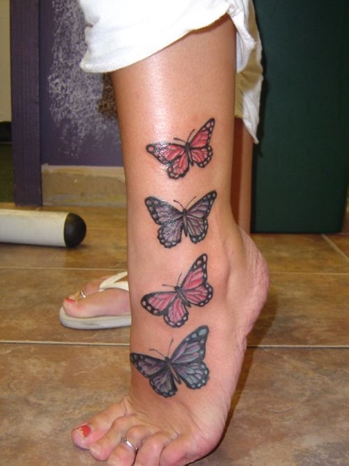 Red and blue butterflies girl tattoo on leg