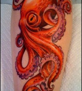 Red lovely octopus tattoo on arm