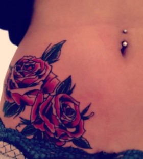 Red roses girl tattoo on hip