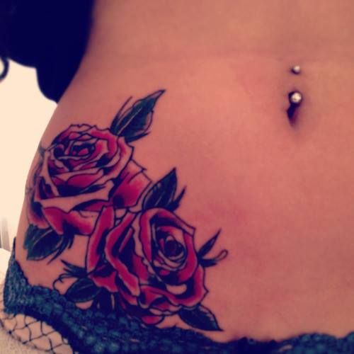 Red roses girl tattoo on hip