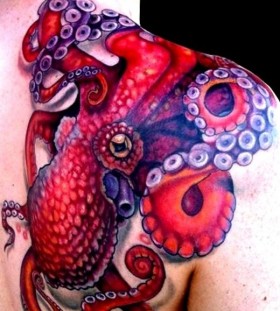 Red shoulder octopus tattoo on arm