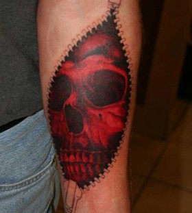 Red skull zip tattoo