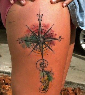 Sharp ornaments compass tattoo on leg