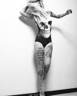 Skull and amazing girl tattoo on leg