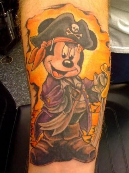 Skull cap with Mickey Mouse tattoo on leg