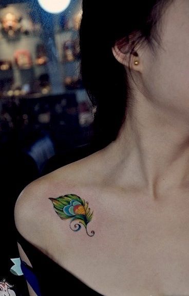 Small shoulder peacock tattoo