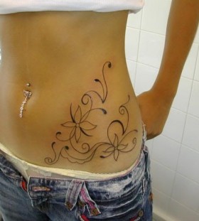 Traditional flowers girl tattoo on hip