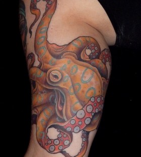 Traditional style octopus tattoo on arm