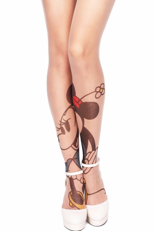 White flower and Mickey Mouse tattoo on leg