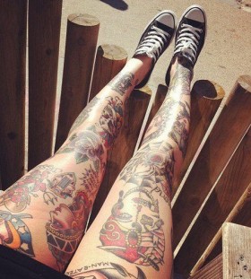 White trainers and girl tattoo on leg