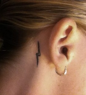 Women's back ear Harry Potter tattoo