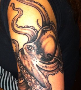 Wonderful black octopus tattoo on leg