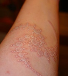 Yellow lovely bubbles tattoo