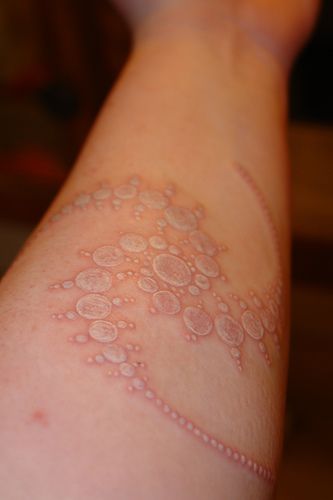 Yellow lovely bubbles tattoo