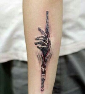 Zombies hand and zip tattoo