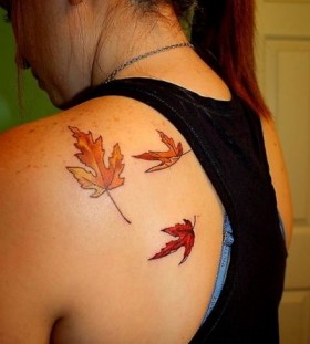 autumn leaves tattoo on the back